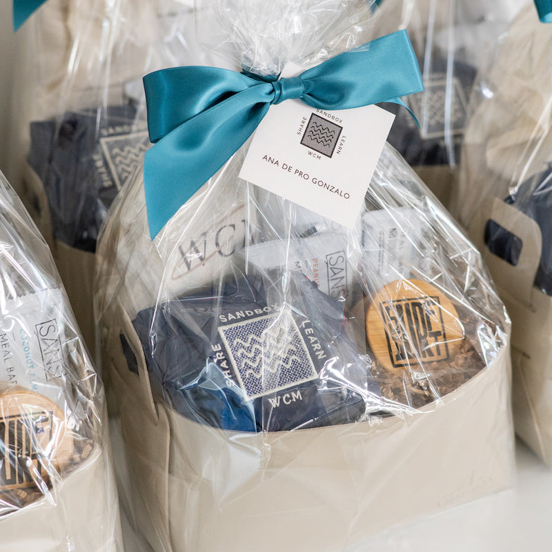 custom branded corporate incentive trip gifts for Sandbox in leather baskets