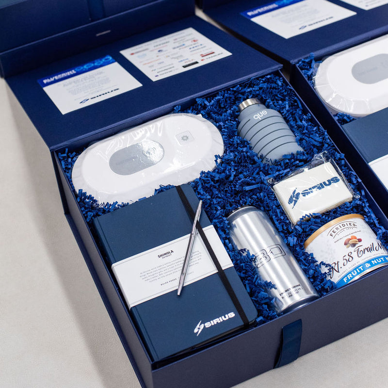 Explore virtual event gift boxes from the award-winning custom design team at MARIGOLD & GREY. Our virtual meeting gifts add a spark to any remote event.