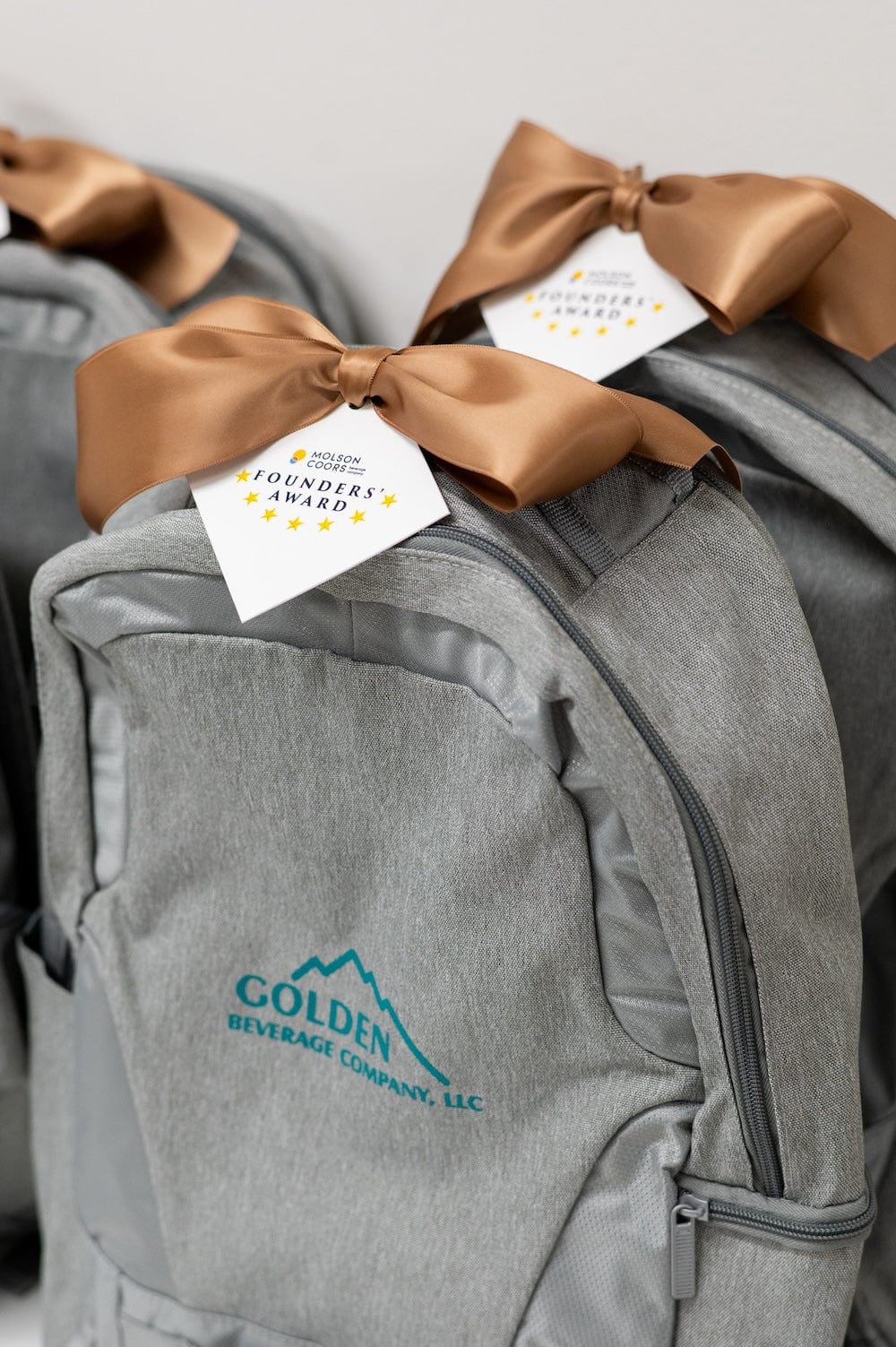 Custom Branded Backpacks for corporate Incentive trip by Marigold & Grey