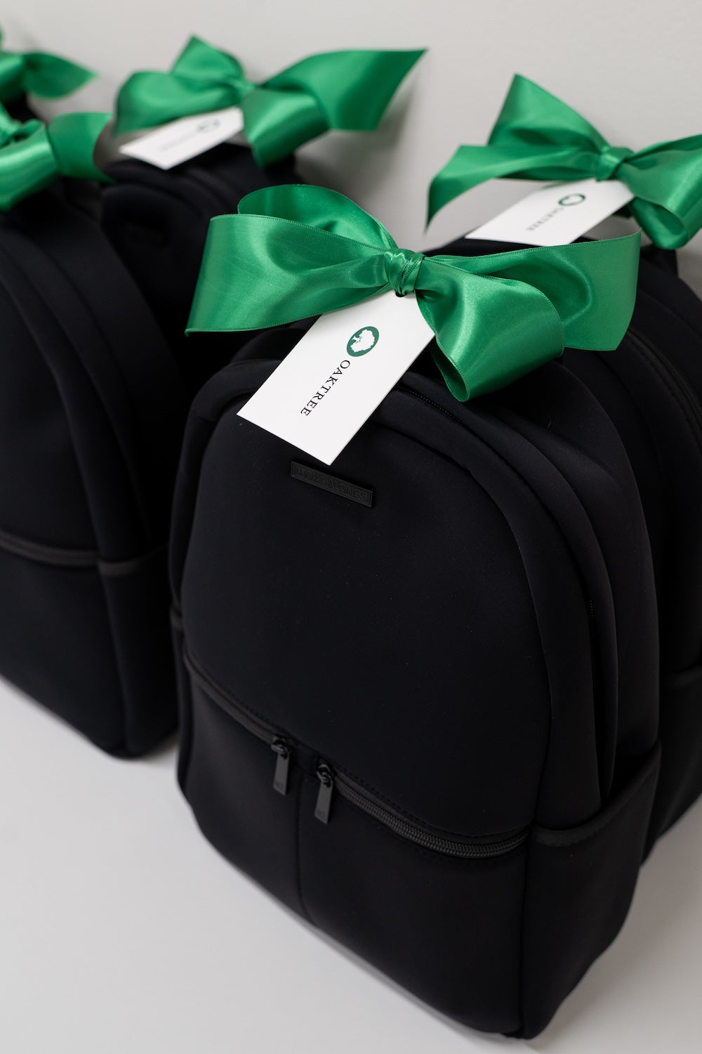 Custom Branded, Black, White & Green, California-Themed Travel Backpack Corporate Event Gifts by Marigold & Grey
