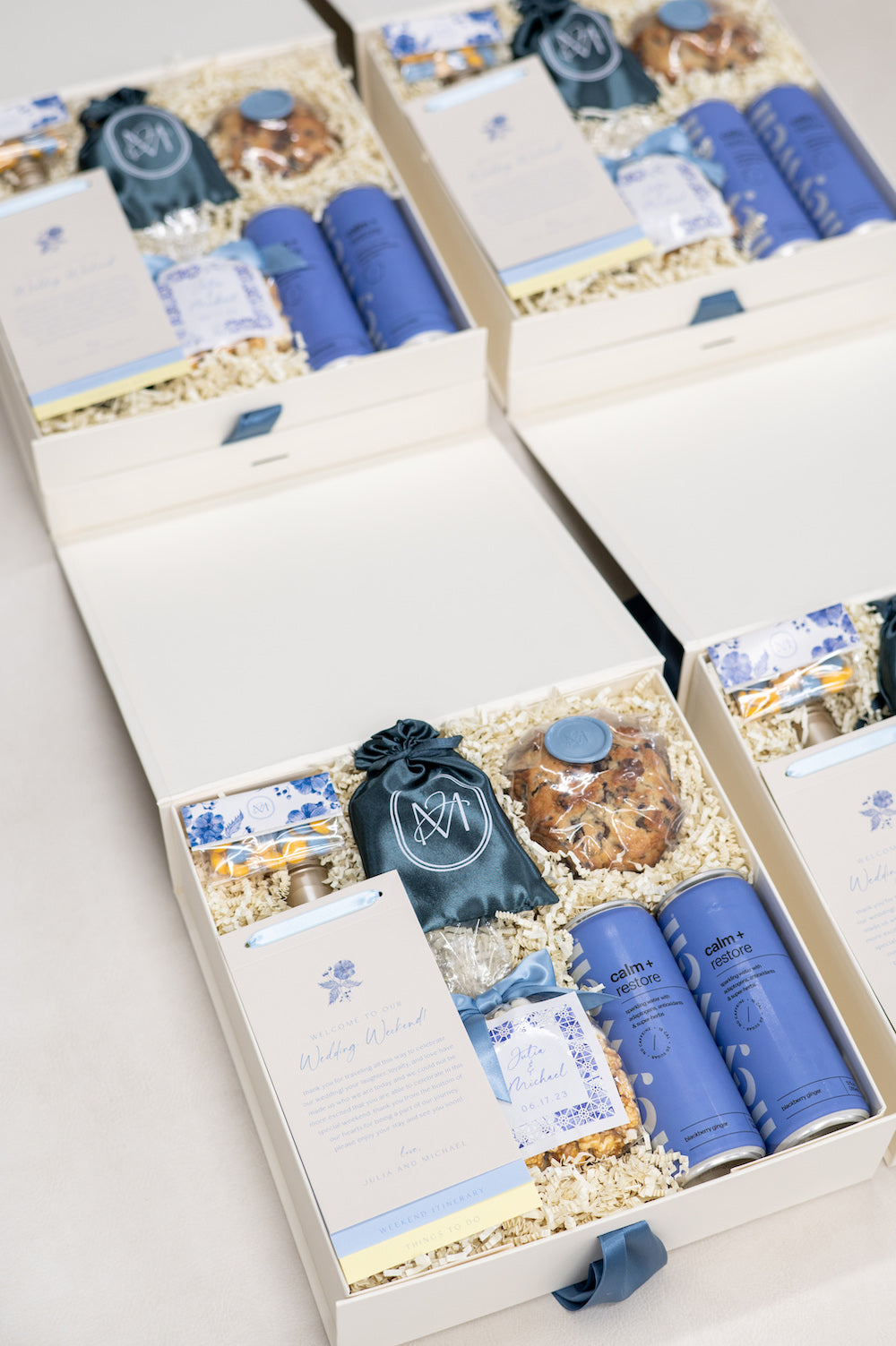 Custom Monogrammed Dusty Blue Welcome Gifts Sets for Hotel Guests by Marigold & Grey