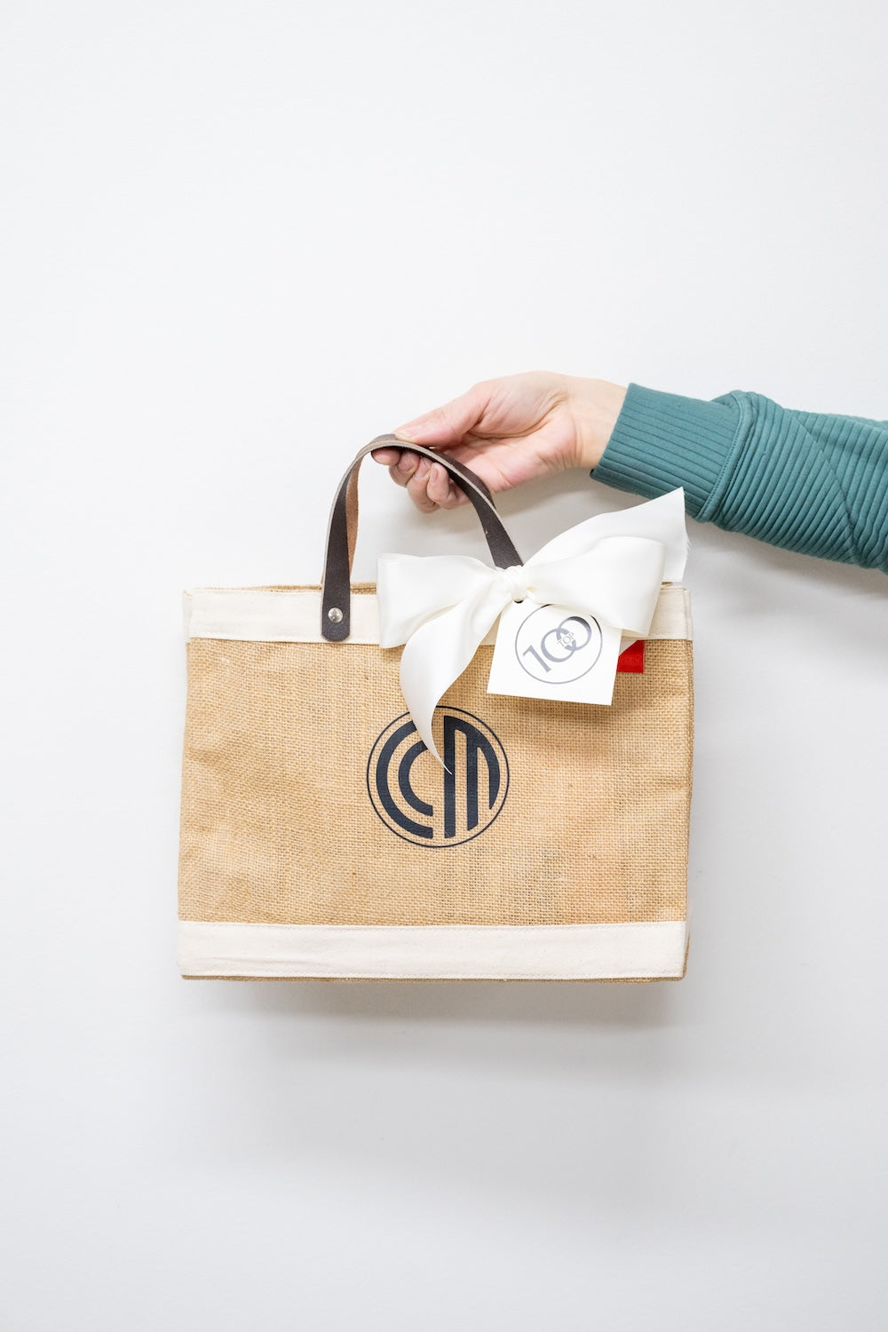 Orange & White Custom Branded Mexico-Themed Corporate Incentive Trip Gift Bags by Marigold & Grey