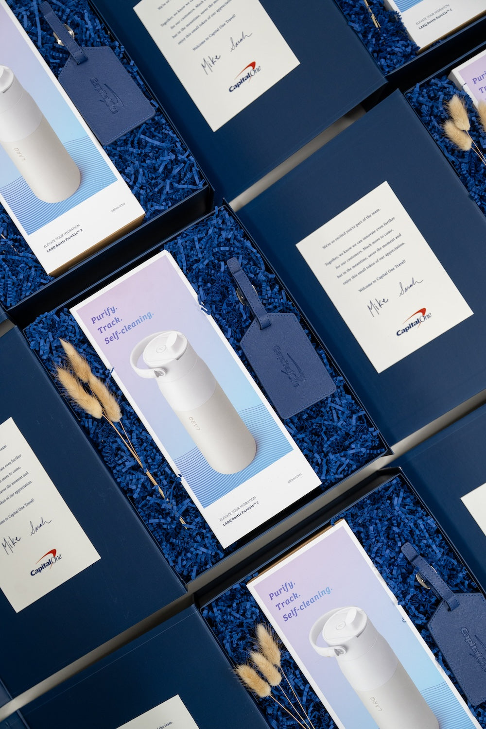 Blue & White Custom Branded Travel-Themed New Employee Corporate Onboarding Gifts by Marigold & Grey