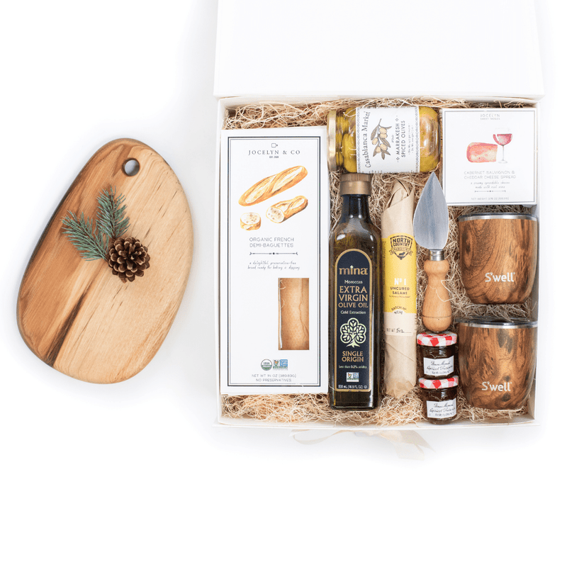 Enjoy the signature holiday food gift box by M&G, 'Eat, Drink & Be Merry',  a charcuterie-inspired gift set. 100% woman-owned and led. Free U.S. shipping.