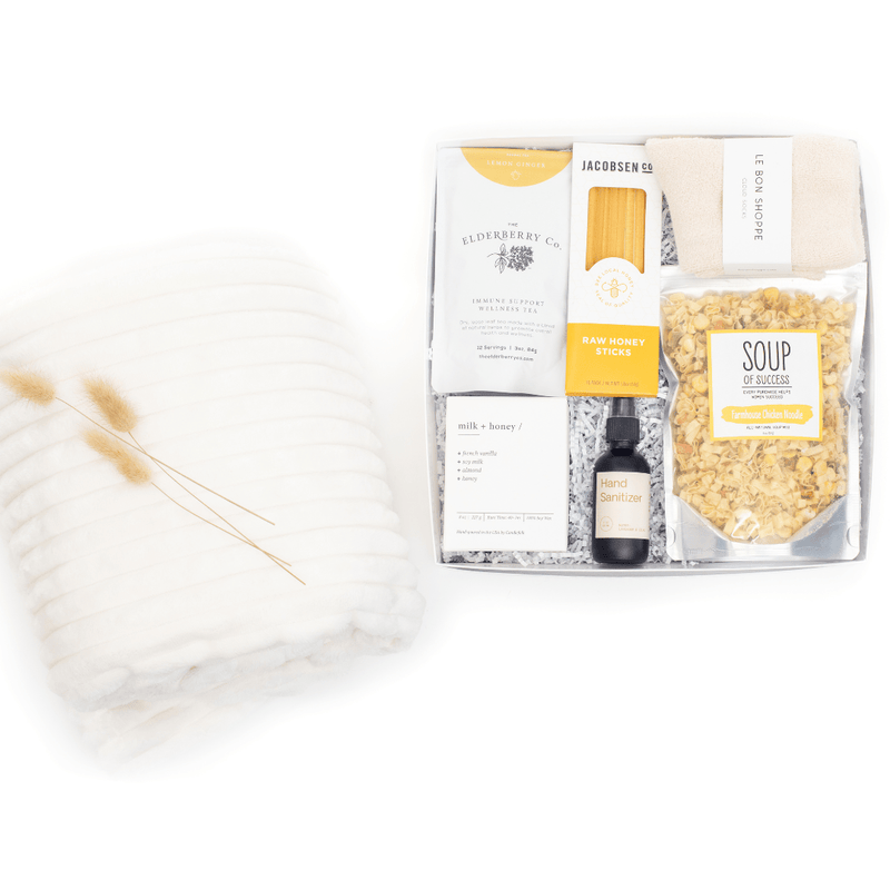 Brighten someone's day and help them on their way to recovery with our signature 'Get Well Soon' gift box. Overflowing with thoughtful contents for relaxation, healing, and health.